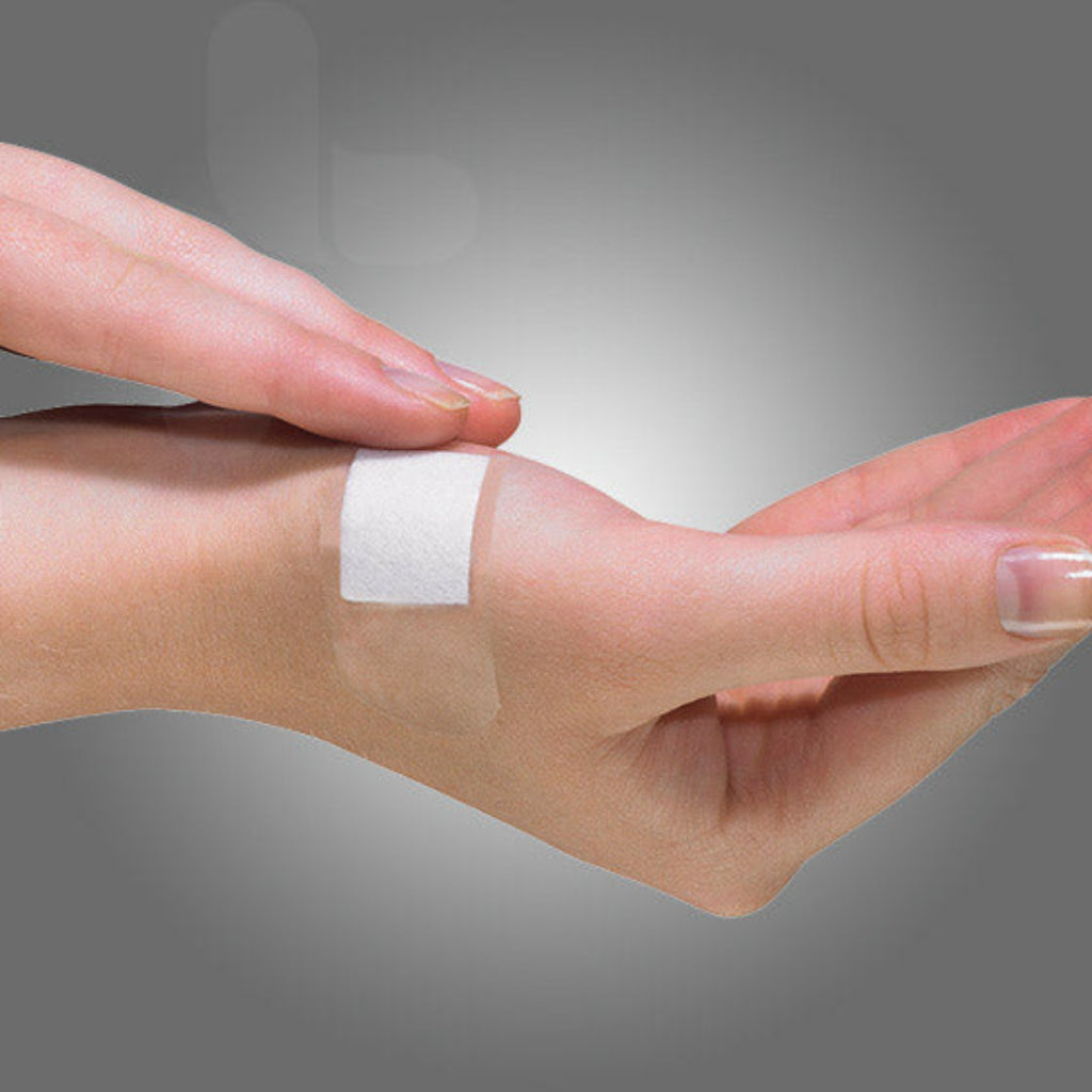 Student First Aid extra wide transparent strips on hand